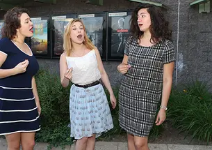 From left, Wildcats a cappella members Kat Giordano â18, Arianna Lanz â17, and Samone Blair â18 review Pitch Perfect 2 with PAW senior writer Mark F. Bernstein â83. (Beverly Schaefer)