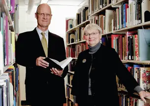  Librarian Karin Trainer (right) and University Architect Ron McCoy *80 review new shelving planned for Firestone Library as part of its forthcoming renovation. 