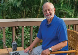 “What I’ve tried to do all along is to report about real people,” says Joe Day ’58, at his home on Kauai.
