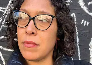 This is a headshot photo of Catherine Saint Louis.