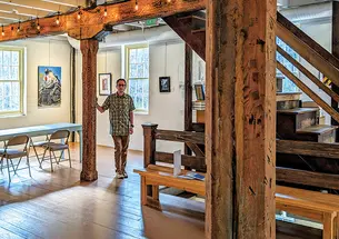 Angelo Otterbein ’95 inside Manor Mill, left, and what it looked like before the renovations were underway, above.