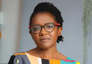 This is a headshot photo of Temitayo Ogunbiyi ’06