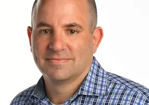 This is a headshot photo of Peter Barzilai.