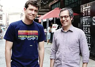  Jonathan Butler ’92, left, and his business partner Eric Demby at the Brooklyn Flea’s SmorgasBar at South Street Seaport in Manhattan.