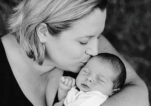 Mary McNealy Czarnecki ’00, with son Jonathan, is happy with small-town life in Newberg, Ore., population 22,000.