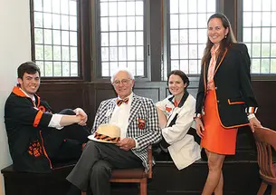 From left: Reisman ’14, Miller ’49, Thomas ’09, and Coates ’89