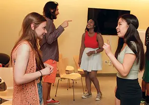 Reuners learn the fine points of improv from the Lobster Club.