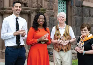 Service Award winners: Richard Just ’01, Itohowo Ekpoudom ’03, Robert Loveman ’69, and Colleen Kelly ’77 