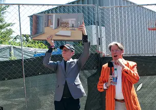 Museum director James Steward speaking outdoors