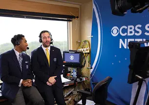 Ross Tucker ’01, right, makes one of his many broadcasting stops this fall, calling the Army-Boston College game in West Point, New York.