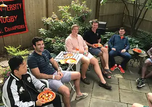 Rugby club students and alumni fight the Sunday scaries with casual conversation in 2017.