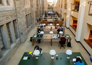 Students study in Firestone Library in 2021.