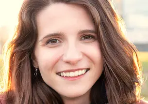 This is a headshot photo of Rosaria Munda ’14.