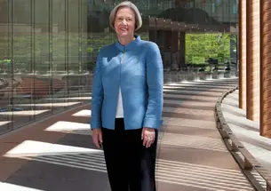 President Shirley M. Tilghman stands on newly named Tilghman Walk, which will link the Lewis Center for the Arts to science buildings housing genomics, neuroscience, and psychology.