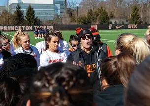 Jenn Cook speaking to her team