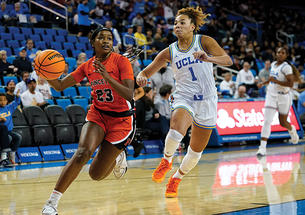 Madison St. Rose ’26 drives to the basket against UCLA