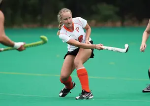 Rachel Neufeld ’12, center, and the Tigers are learning to play without four All-America honorees who have taken leave from the University to pursue their Olympic dreams.