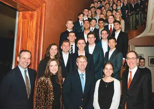 ROTC pose for photo at a presidential dinner.