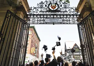 Princeton’s newest alumni make their exit through FitzRandolph Gate following Commencement.
