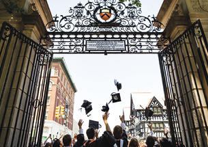 Princeton’s newest alumni make their exit through FitzRandolph Gate following Commencement.