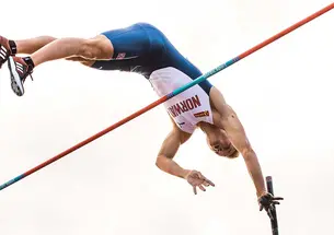 This is a photo of Sondre Guttormsen ’23 competing in the pole vault for Norway.
