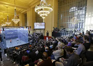 Fans watch the Tournament of Champions squash tournament at New York City’s Grand Central Terminal in January 2015. 