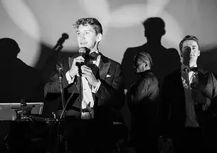 Benjamin Edwards ’20 and Alexander Kirschenbauer ’20 speak at the Solstice Ball.