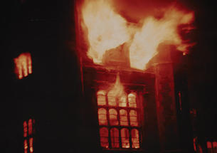 The University Gymnasium in flames.