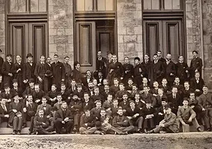 The Rev. Hugh Halton outside the historic St. Thomas Aquinas House in January 1957.