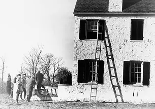 Police investigate the kidnapping of Charles Lindbergh’s son at the family home near Princeton.