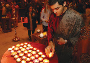 Manav Lalwani ’09 takes part in the celebration of Diwali in November. It was the first time a Hindu festival was celebrated in the Chapel. 