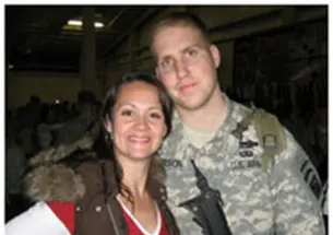 Lauren (Holuba) Nelson '04, shown with her husband Tom in February, was honored for her efforts supporting wives and families of men who served in Afghanistan and Iraq.