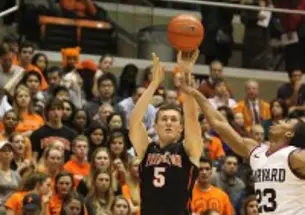 T.J. Bray '14 led Princeton with 17 points in his final game against Harvard. The Tigers' freshmen combined to score 25 points in the 59-47 loss. (Photo: Beverly Schaefer)