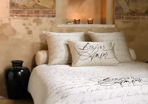 Bed linen designs for Slabbinck Home Creations, Bruges, Belgium. Calligraphy woven into damask linen/cotton blend. The text on the bed linens is Shakespeare’s Sonnet 18, “Shall I compare thee to a summer’s day...” On the pillow case are the word