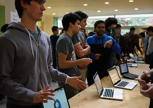 Collin Stedman â15, left, pitches HostShark at the HackPrinceton science fair. (Mary Hui â16/Picture Perfect)