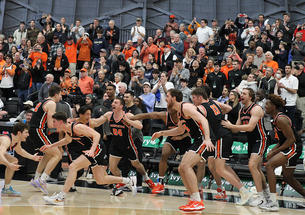 Players celebrate near the bench