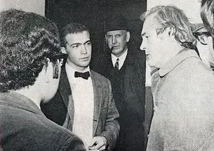 Proctor âAxelâ Peterson, with pipe, looks on as students interview Dr. Timothy Leary. (George Peterson â69/PAW Archives)