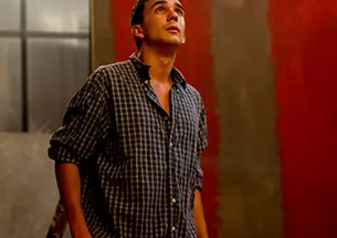 Ryan Gedrich ’16 as Ken, assistant to the artist Mark Rothko, in Theatre Intime’s production of Red.