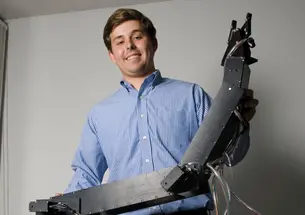 robotics_Arm3763.jpg Ben Rush ’11 and his submersible arm.