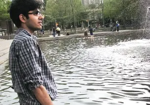 robotics_MantaBotFountain.jpg Javed tests his manta bot in the Woodrow Wilson School fountain.