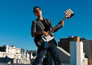 robotics_tuner0196-1A.jpg Luis Villaran ’11 and his robotic guitar tuner.
