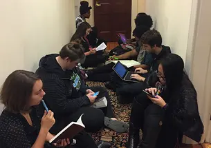 On Wednesday afternoon, the sit-in spilled into the hallway outside President Eisgruber â83âs office. (Mary Hui â17)