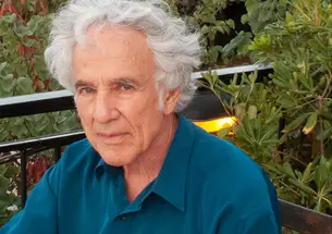 This is a headshot photo of Stanley Corngold outdoors.