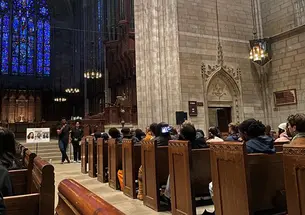 Attendees remember Misrach Ewunetie ’24 at a vigil in the Chapel on Monday.