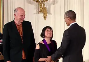 National Medal of Art recipient Tod Williams â65 *67, left, looks on as President Barack Obama congratulates Williamsâ wife and fellow honoree Billie Tsien. (WhiteHouse.gov)