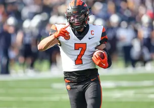 Dylan Classi runs after catching a pass.