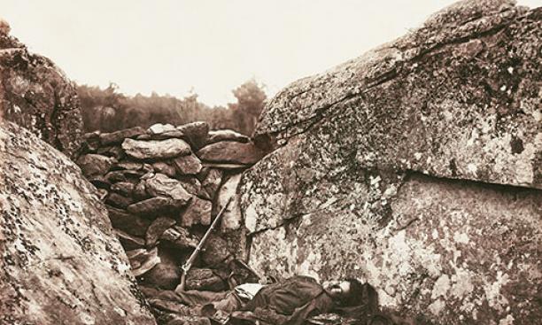 Home of a Rebel Sharpshooter, Gettysburg, July 1863: Gardner drew on his poetic instincts as he imagined the death of this “rebel sharpshooter”: “What visions, of loved ones far away, may have hovered over his stony pillow!” Recent scholarship has