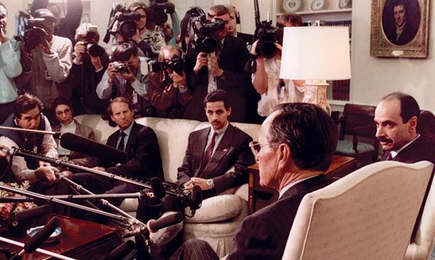 Nawaf al-Sabah ’94, center, in the Oval Office with his father, right, and President George H.W. Bush at a press conference.