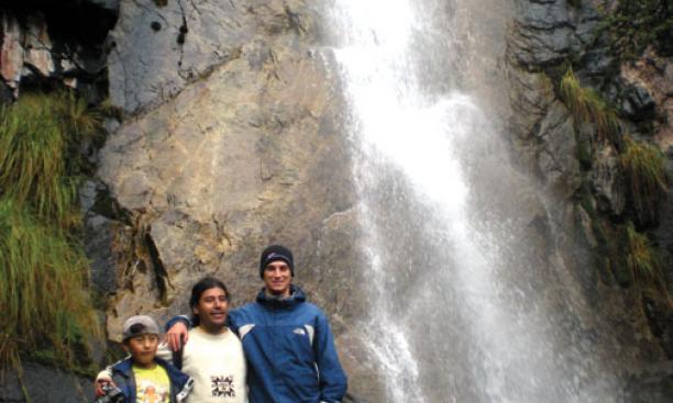 Brian Reilly ’14, far right, at a waterfall in Peru.