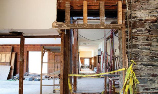 A first floor view of renovations under way at Cannon Dial Elm Club. The stairwell at center is being removed.